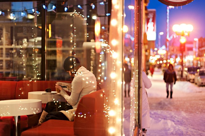 Girl Reading In Coffee Shop Image